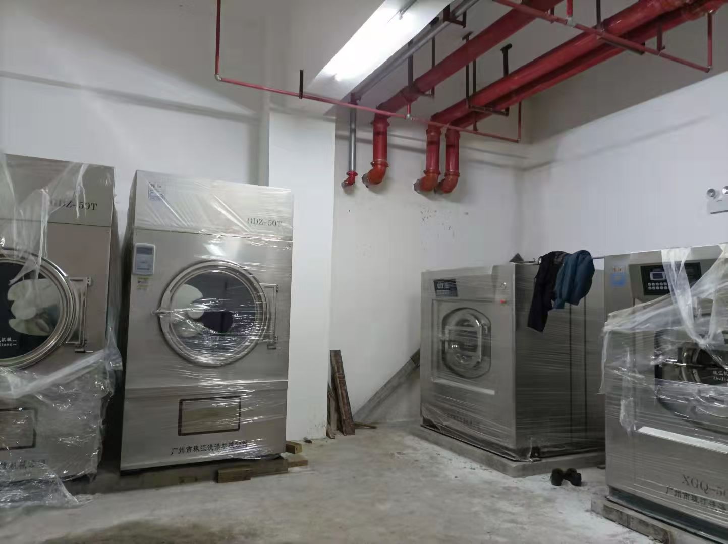 珠江洗滌設備為酒店提供高效廣州工業用洗衣機定制廠解決方案